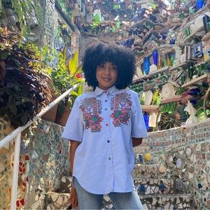 Short sleeve button down with jewel buttons and native/western design